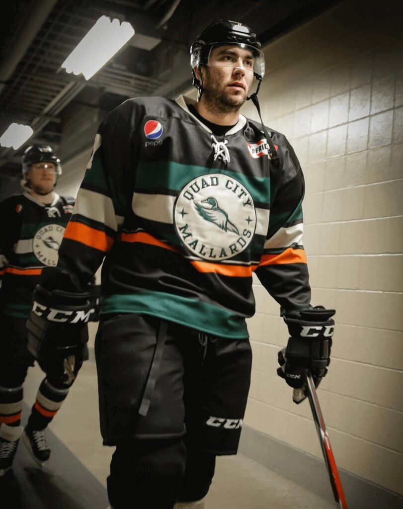 Bennett Schneider walking to the ice as a professional hockey player